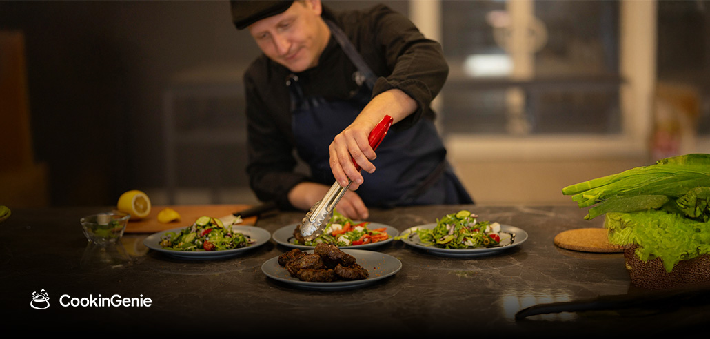 Personal chef plating fresh meals at home